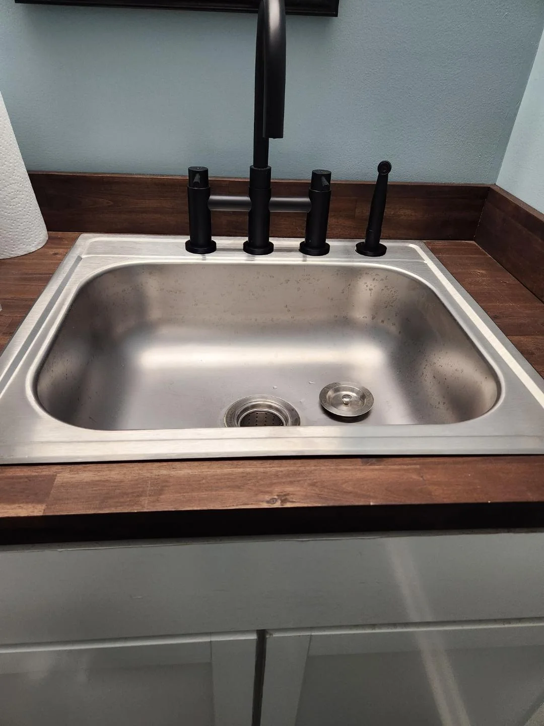 Commercial bathroom sink and faucet installation